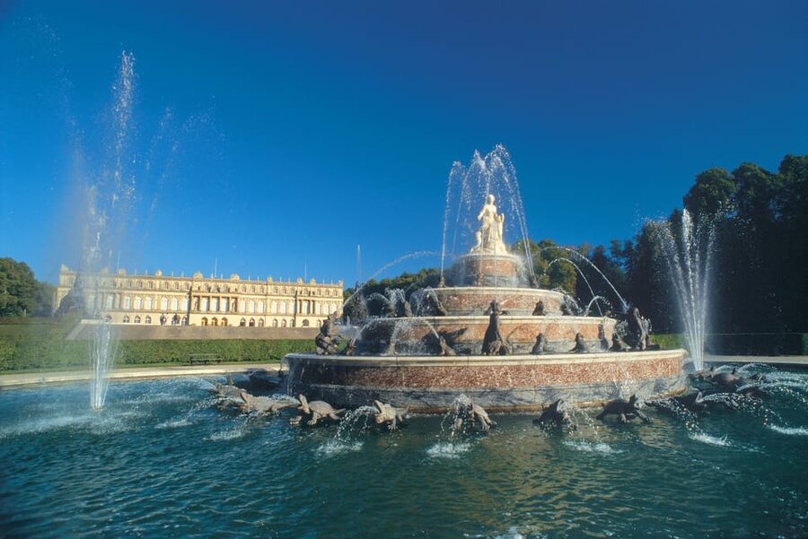 From Munich: Herrenchiemsee Palace and Boat Trip Day-Tour - Inside Herrenchiemsee Palace: opulence with a purpose