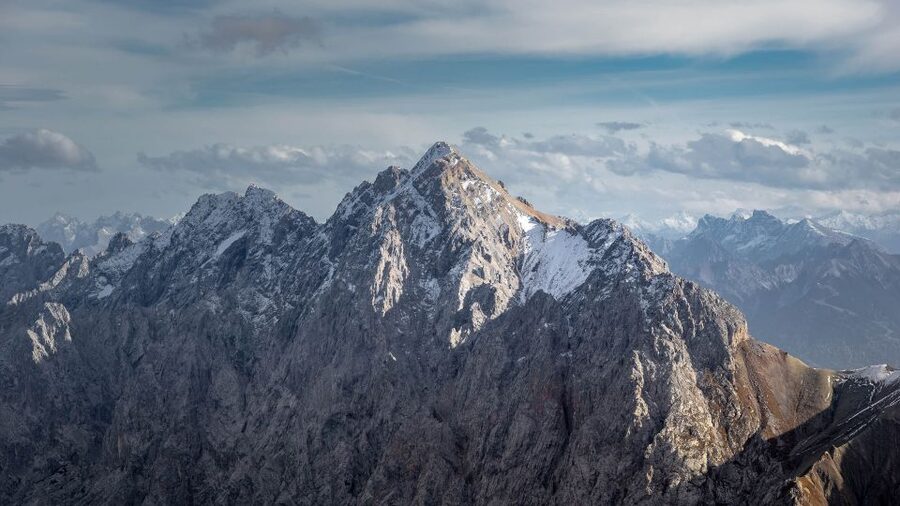 From Munich: Zugspitze Mountain Van Tour with Garmisch Town - Lunch at a mountain hut, then the Austria beer garden moment