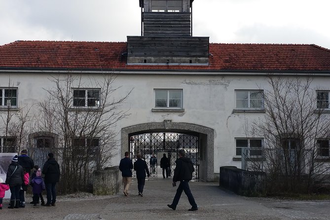 Guided Dachau Concentration Camp Memorial Site Tour with Train from Munich - Barracks, crematorium, and punishment areas: why site coverage matters