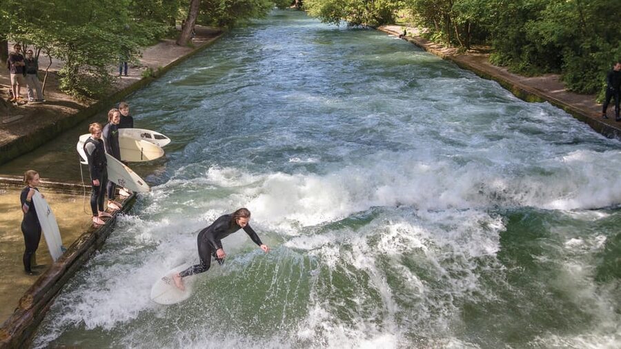 Munich: Eisbachwelle River Surfing Experience - Equipment setup: why the soft-top board and 5 mm suit are a big deal