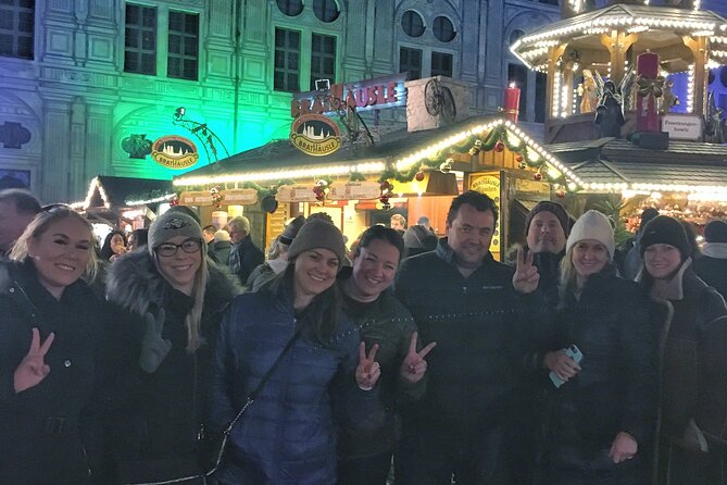 Original Munich Christmas Market Tour with Festive Wine and Food - Odeonsplatz and the Residence Palace courtyard: a medieval mood switch