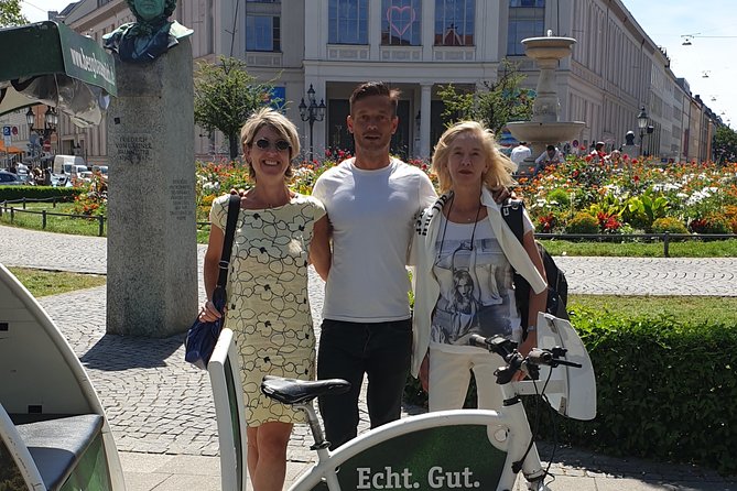 Private Munich Rickshaw City Tour and English Garden - Viktualienmarkt: the butcher line, the market buzz, and 149 stalls